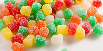 Sugar-reduced gummies with fiber