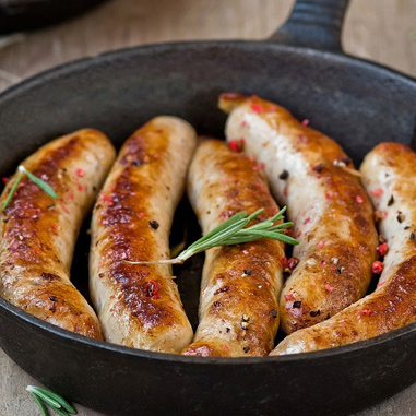 Plant-based sausage in skillet