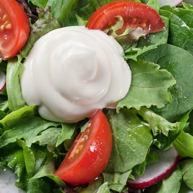 Salad dressing with reduced egg